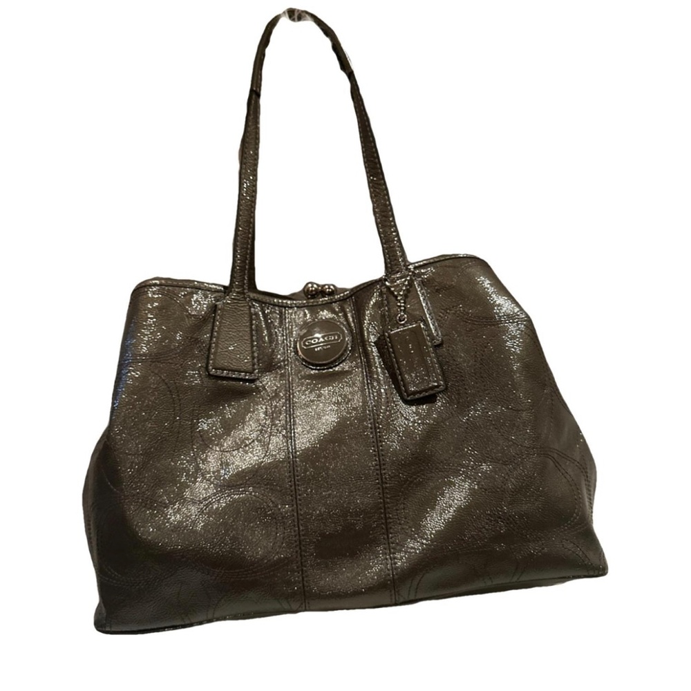 Shiny silver medium shoulder bag. With blue lining and silver hardware.